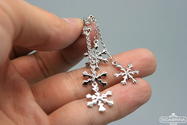 Kabantys sidabriniai auskarai - AUM613